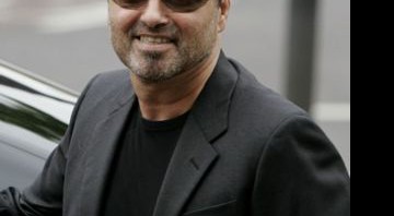 George Michael regravou "True Faith", do New Order, para ajudar a instituição Comic Relief - AP