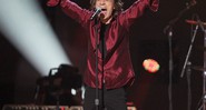 Mick Jagger desfilou toda sua habilidade como dançarino em "Jumpin' Jack Flash" - AP