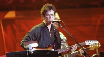 O guitarrista participou de tributo feito a Bob Dylan no Madison Square Garden, em Nova York, em 1992. - Ron Frehm / AP