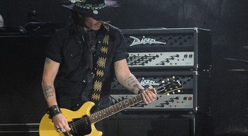 O ator Johnny Depp durante ocasional apresentação como guitarrista - Katy Winn/AP