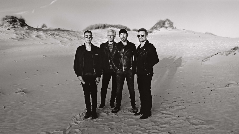 <b>Novos Tempos</b><br>
Larry Mullen Jr., Adam Clayton, The Edge e Bono - Anton Corbjin