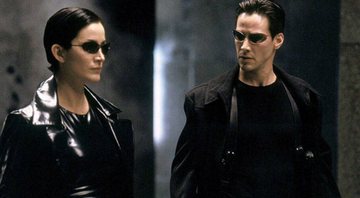 None - Carrie-Anne Moss e Keanu Reeves em Matrix (Foto: Divulgação)