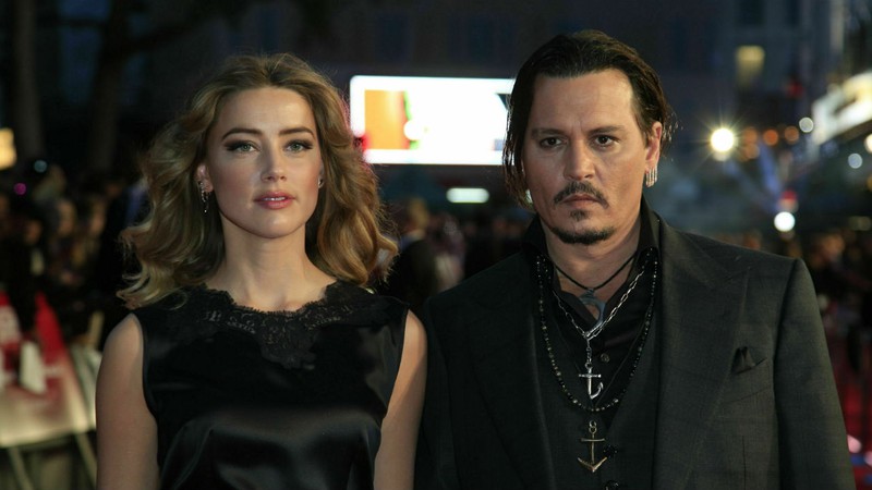 Amber Heard e Johnny Depp (Foto: Jonathan Brady / PA Wire Press Association via AP)