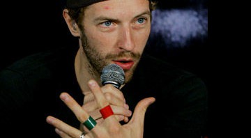 Chris Martin, líder do Coldplay: banda vai doar música para ajudar no tratamento de pacientes com Aids na África - AP