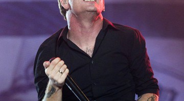 Stone Sour tocou 13 músicas no Rock in Rio. Show começou com "Mission" e terminou com a banda ensopada depois da forte chuva na Cidade do Rock com "30/30-150" - AP