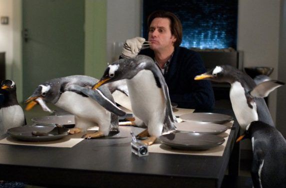 Jim Carrey em cena da comédia Os Pinguins do Papai