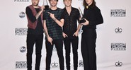 Integrantes do One Direction recebem prêmio do American Music Awards - Jordan Strauss/AP