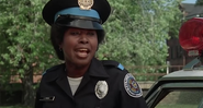Marion Ramsey em 'Loucademia de Polícia' (Foto: Reprodução/Warner Bros.)