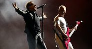 Bono e Adam Clayton, do U2 (Foto: Alexandre Meneghini/AP Images)